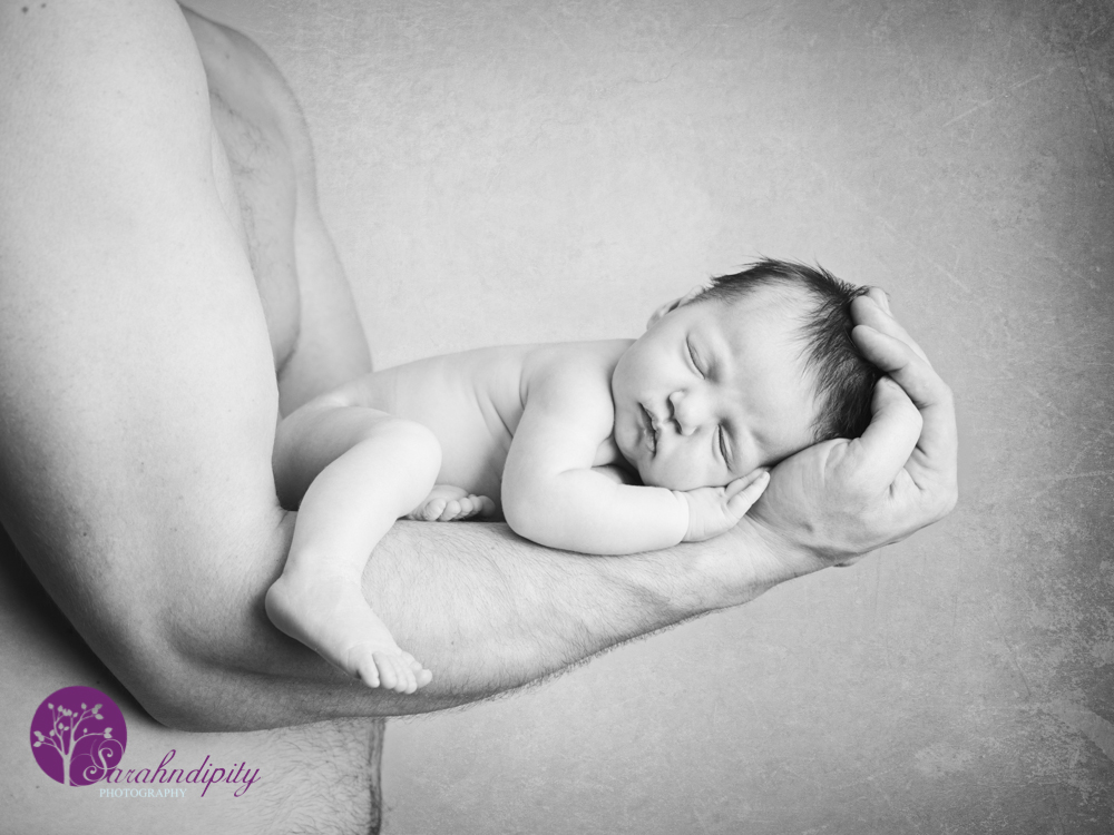 baby in dad arms Baby Photography Thurrock Essex